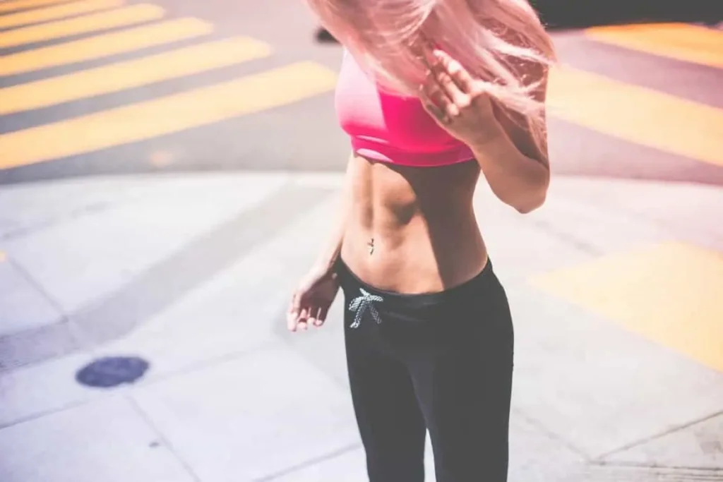 Woman with toned stomach after LA-EMS Body Sculpting Treatment Cranleigh